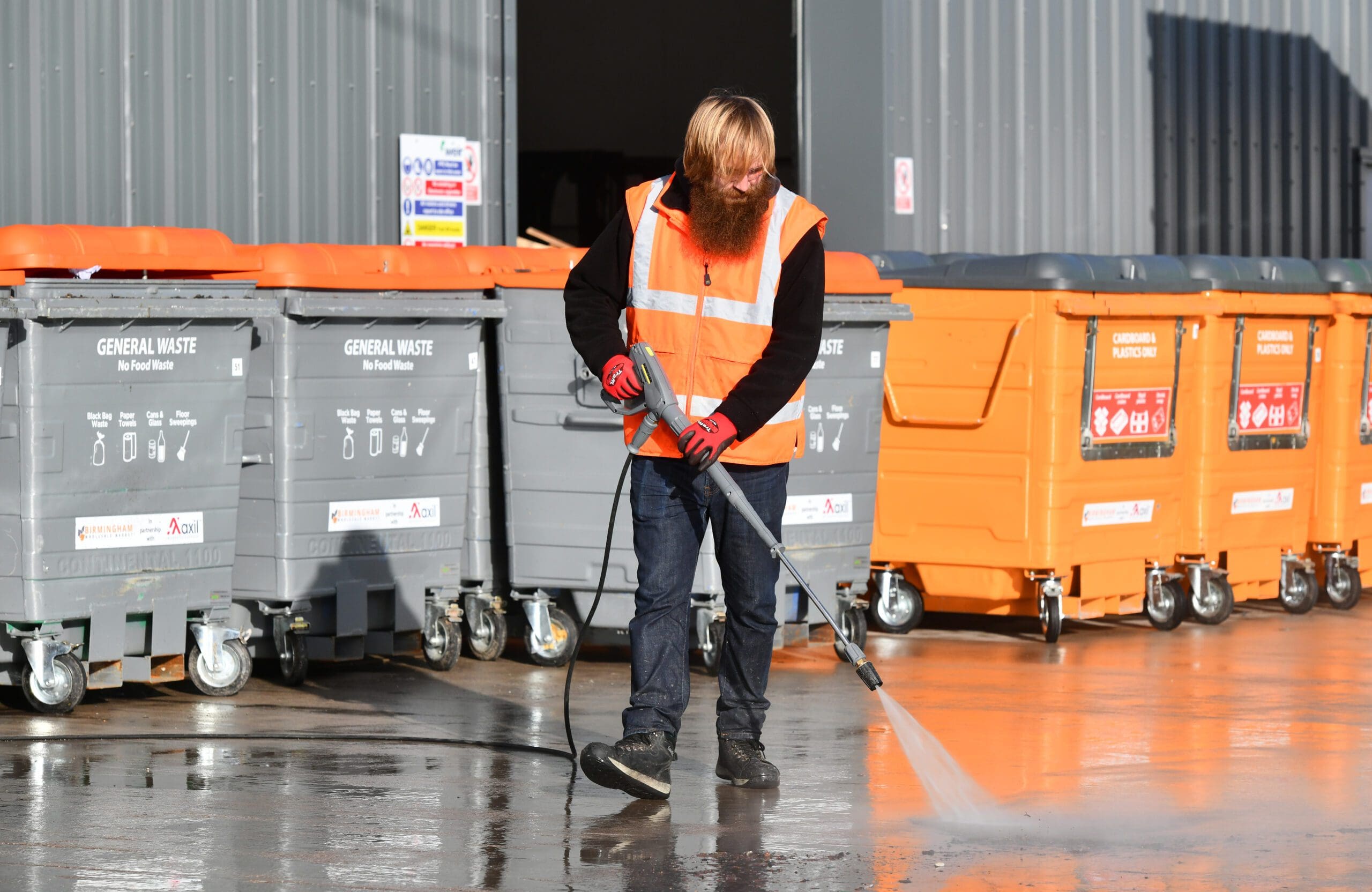 Axil employee cleaning the floors, at Birmingham wholesale market
