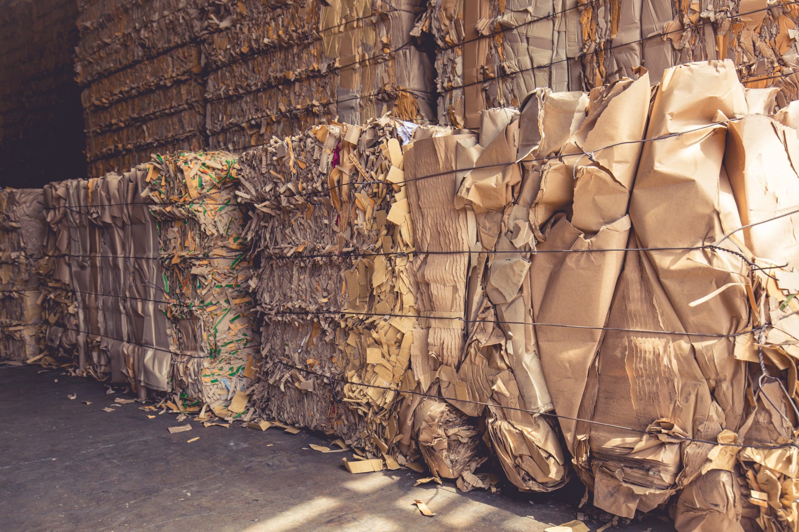 Cardboard bales stacked on top of each other