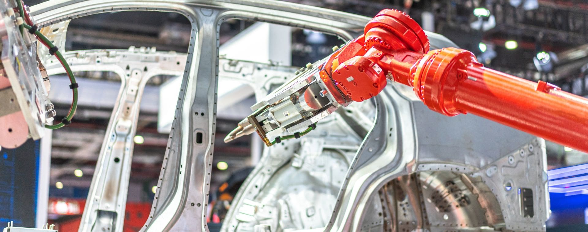 automotive manufacturing company effective waste management - robot arm working