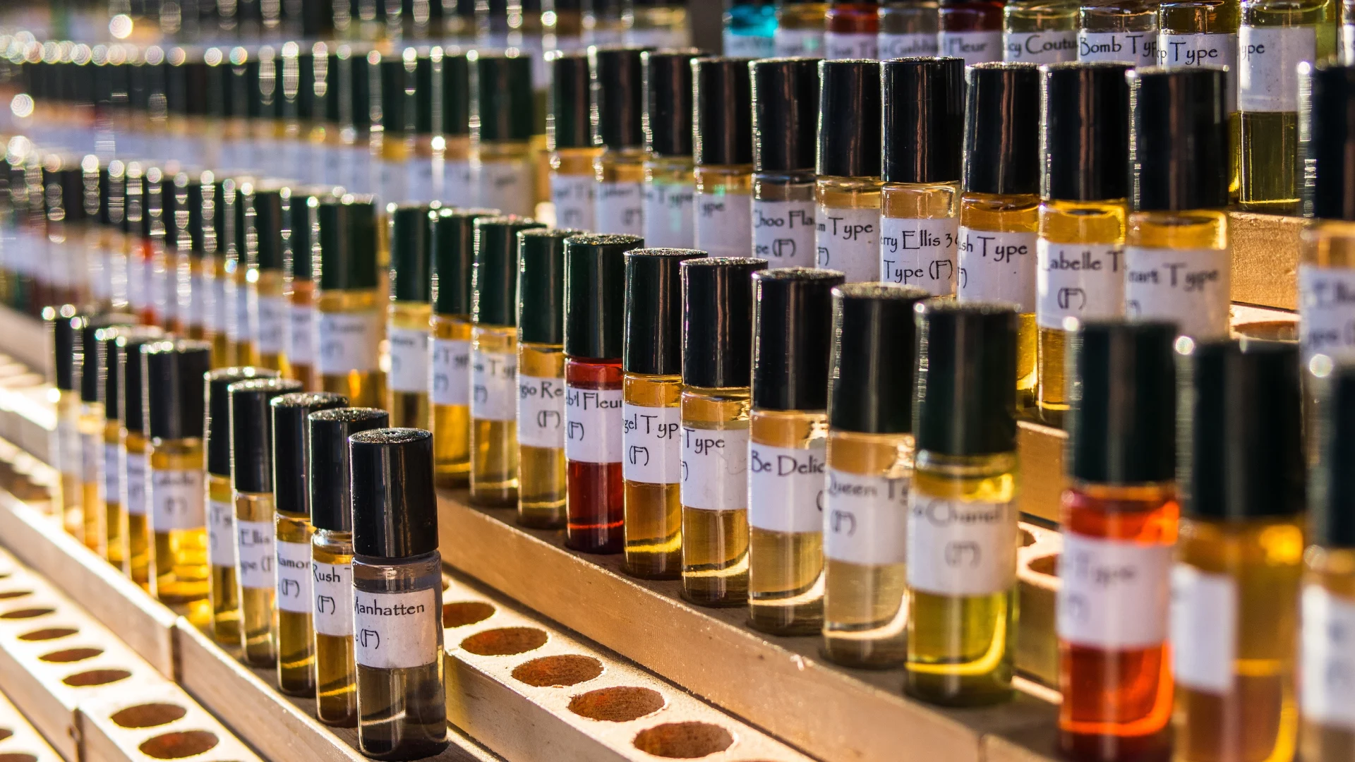 Colourful bottles of liquid in rows